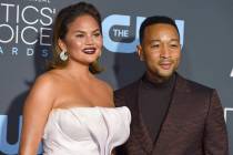 Chrissy Teigen, left, and John Legend arrive at the 24th annual Critics' Choice Awards on Jan. ...