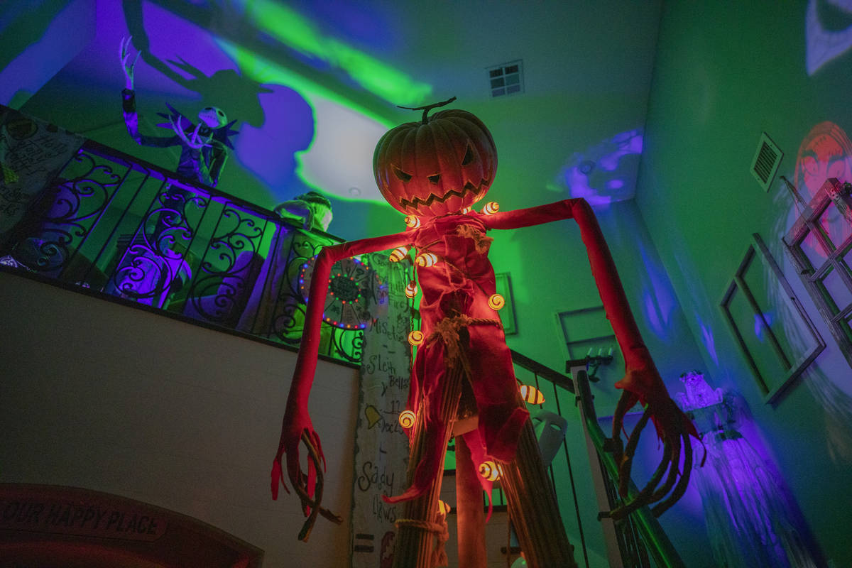 The entryway of the Garcia household is seen in the beginning stages of a Disney-themed Hallowe ...