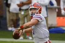 Florida quarterback Kyle Trask (11) releases a pass during the first half of an NCAA college fo ...