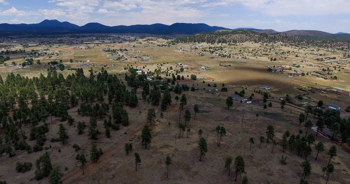 The sun shines over Flagstaff, AZ, on Aug. 1, 2020. While Flagstaff isn't within the Navajo re ...