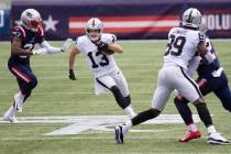 Las Vegas Raiders wide receiver Hunter Renfrow (13) sprints past New England Patriots defensive ...