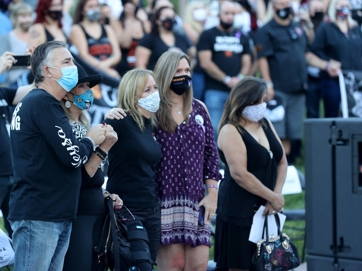 Chris Davis, right, of Las Vegas whose daughter Neysa Tonks was killed in the Route 91 Harvest ...