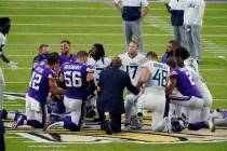 Tennessee Titans and the Minnesota Vikings players meet at midfield following an NFL football g ...