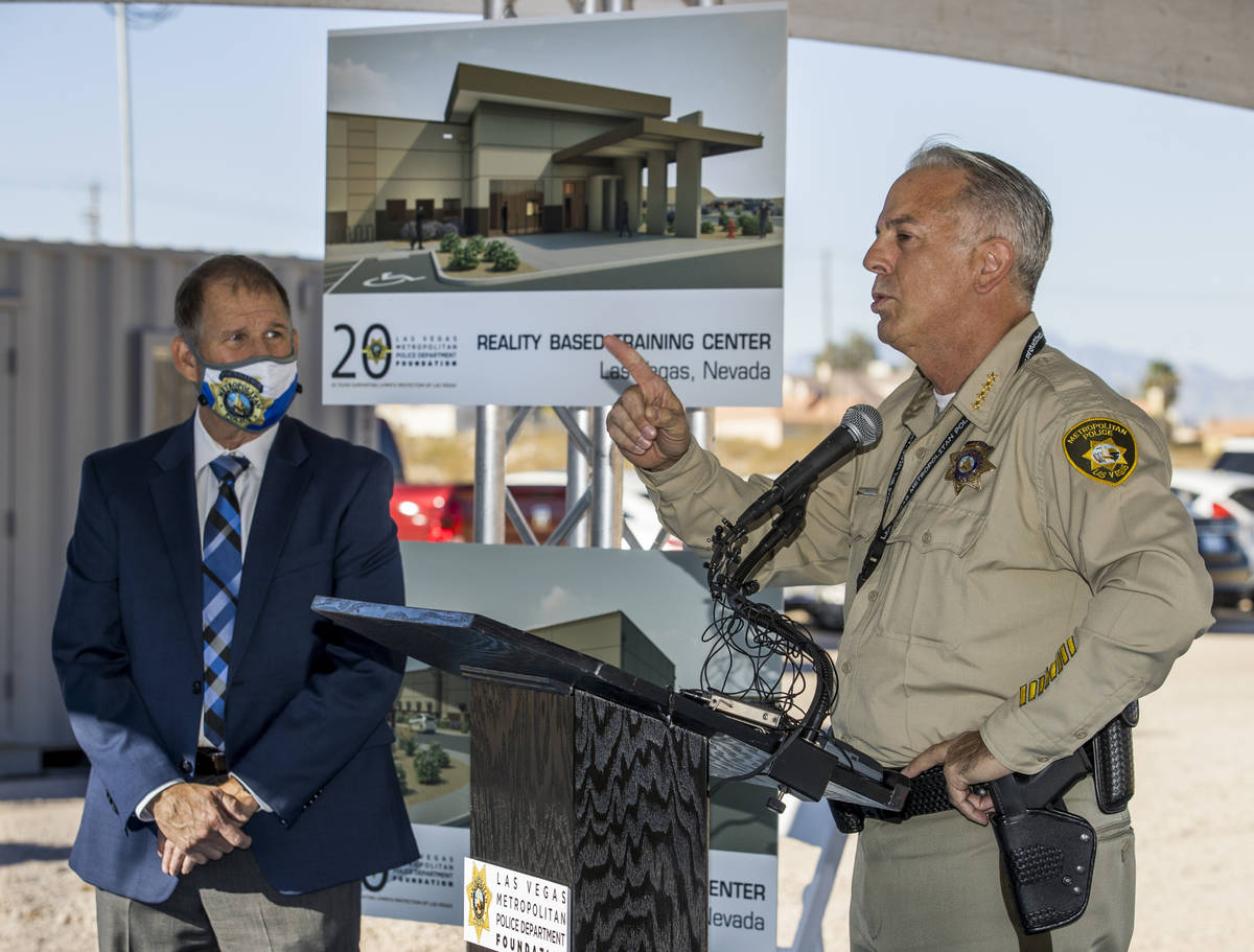 Sheriff Joseph Lombardo, right, thanks Greg Korte of The Korte Company for his construction exp ...