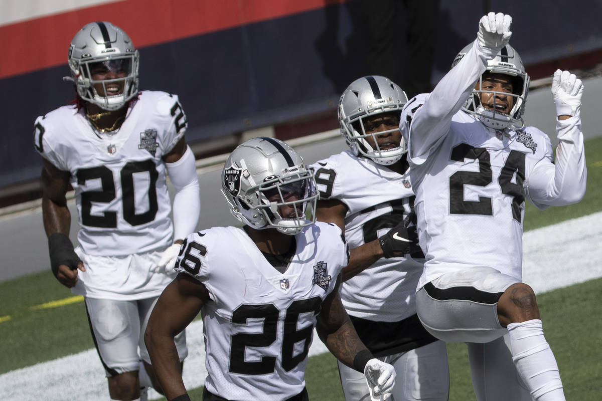 Las Vegas Raiders strong safety Johnathan Abram (24) celebrates with Las Vegas Raiders cornerba ...