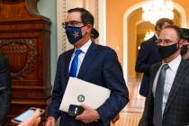 Treasury Secretary Steven Mnuchin, makes a brief comment as he leaves the Capitol, Wednesday, S ...