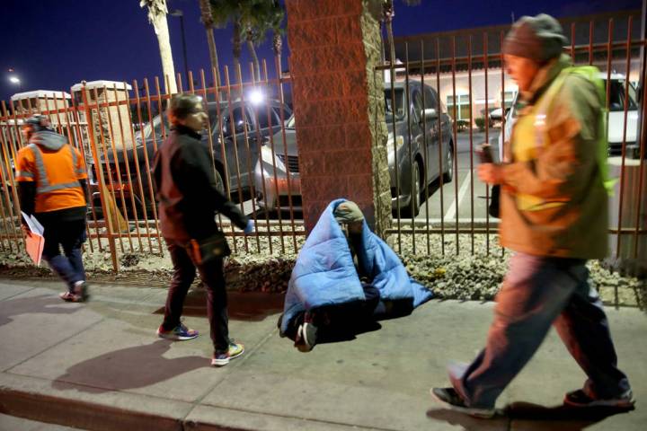 Homeless count volunteers on Las Vegas Boulevard near Foremaster Lane in downtown Las Vegas Wed ...