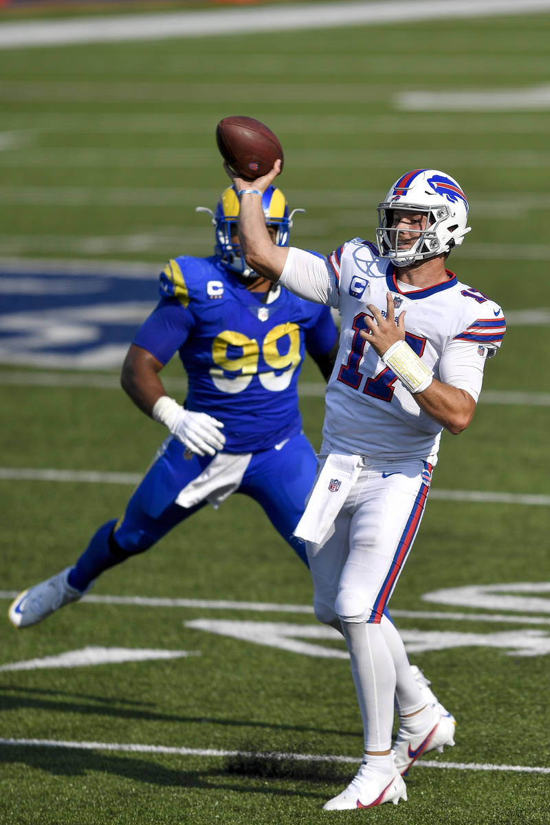 Buffalo Bills quarterback Josh Allen throws a pass against the Los Angeles Rams during the seco ...