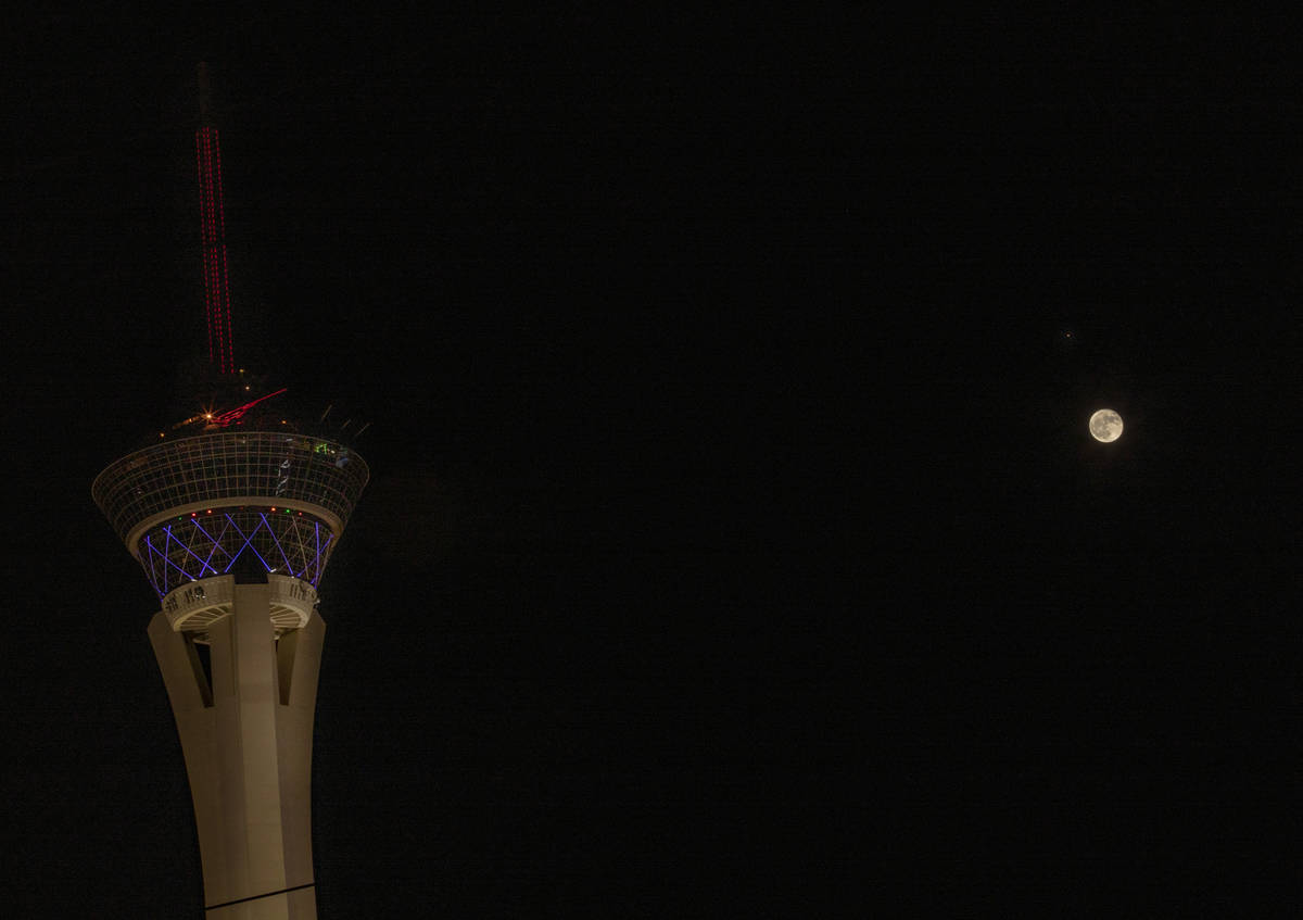 A glimpse of the moon and Mars seen above the Las Vegas Valley on Friday, Oct. 2, 2020. (Elizab ...