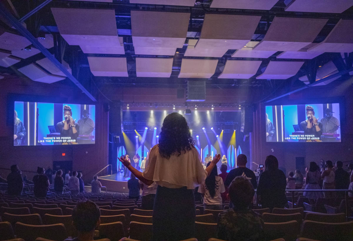 Canyon Ridge Christian Church attendees meet for their first in-person service since mid-March, ...
