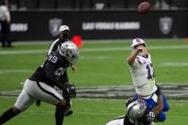 Buffalo Bills quarterback Josh Allen (17) throws as Las Vegas Raiders cornerback Keisean Nixon ...
