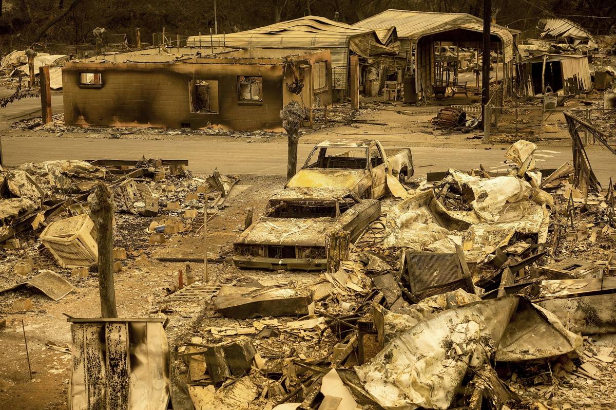 FILE - In this Aug. 20, 2020, file photo, scorched homes and vehicles fill Spanish Flat Mobile ...