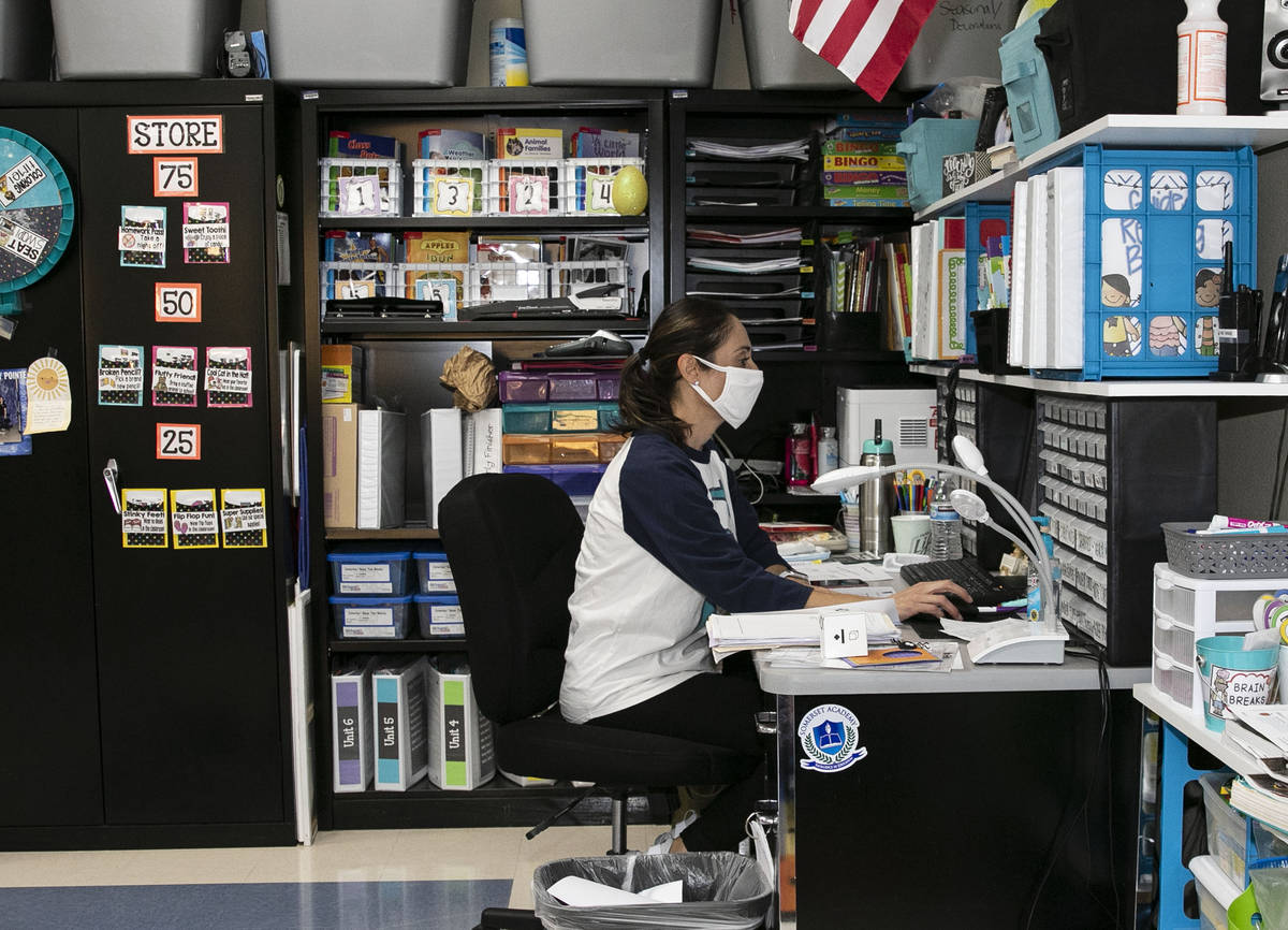 Debbie Martin, second grade teacher, works on her planning at Somerset Academy Sky Pointe as sh ...