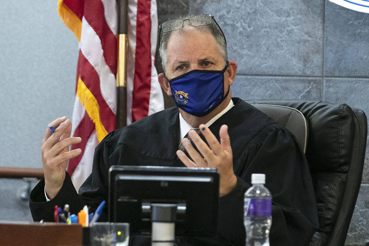 District Judge David Jones presides over a hearing at the Regional Justice Center on whether to ...