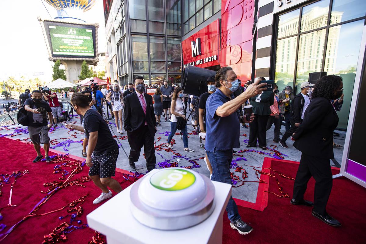 Guests head to the casino after the reopening of the Planet Hollywood Resort in Las Vegas on Th ...
