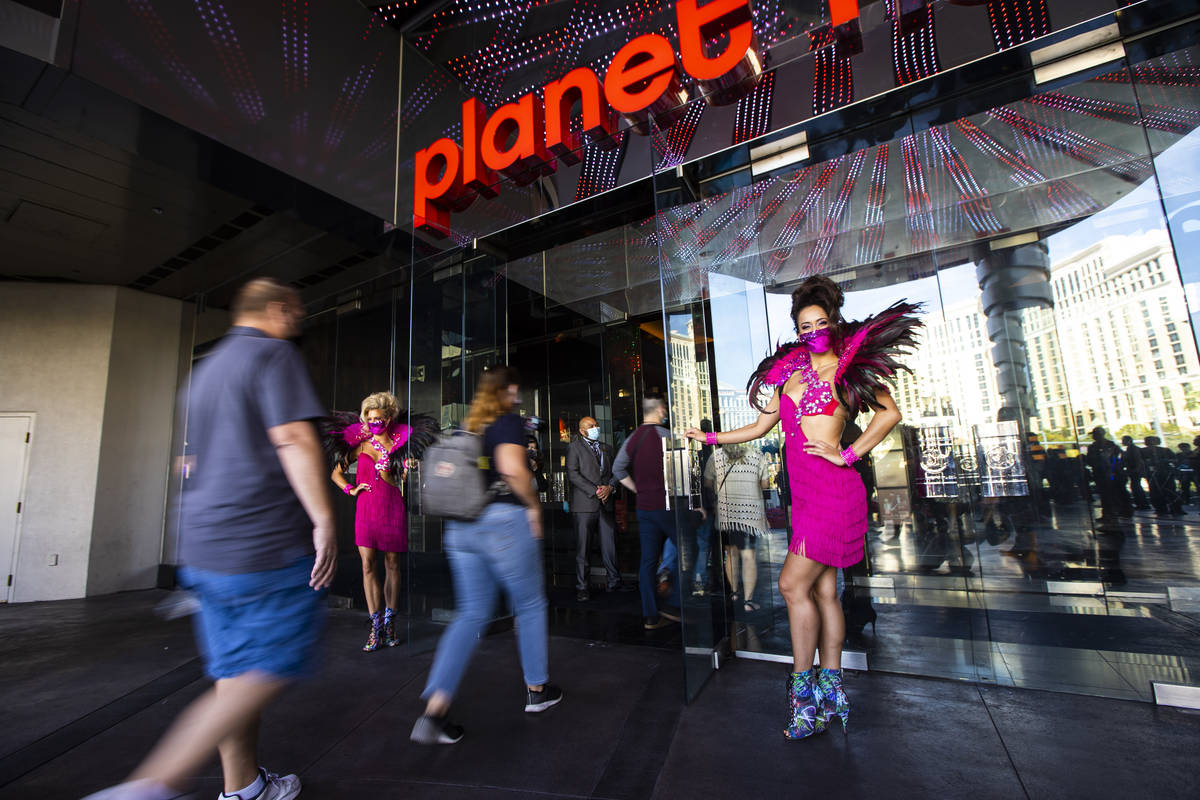 Guests head to the casino after the reopening of the Planet Hollywood Resort in Las Vegas on Th ...