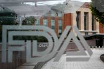 An Aug. 2, 2018, file photo shows the U.S. Food and Drug Administration building behind FDA log ...