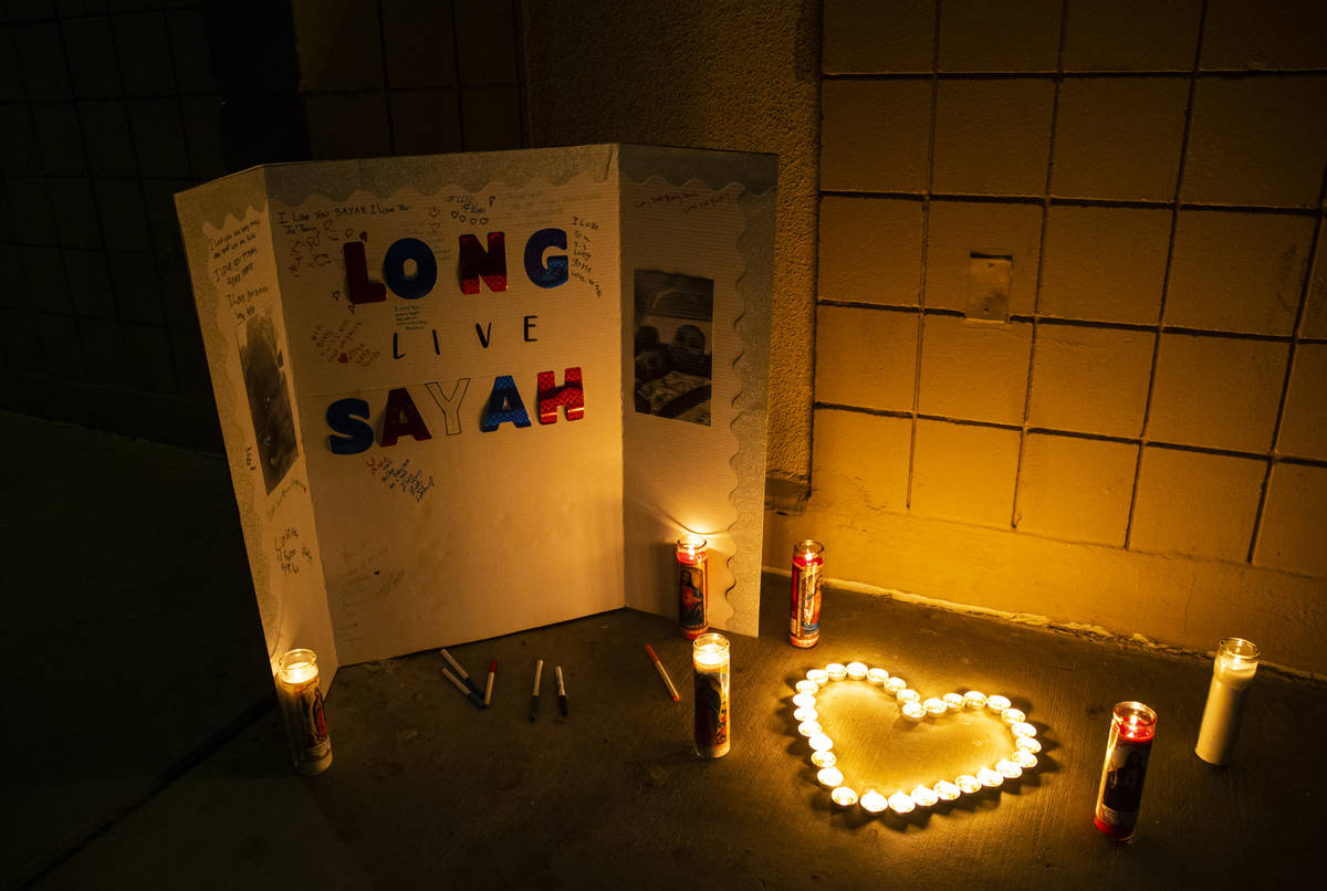 Candles are lit in memory of 1-year-old Sayah Deal in Las Vegas on Tuesday, Oct. 6, 2020. Deal ...