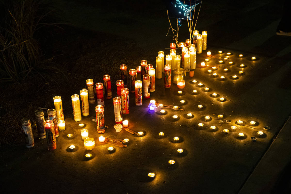 Candles are lit in memory of 1-year-old Sayah Deal in Las Vegas on Tuesday, Oct. 6, 2020. Deal ...