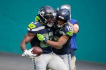 Seattle Seahawks wide receiver David Moore (83) scores a touchdown against the Miami Dolphins a ...