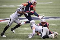 Las Vegas Raiders defensive tackle Maurice Hurst (73) tackles New England Patriots wide receiv ...