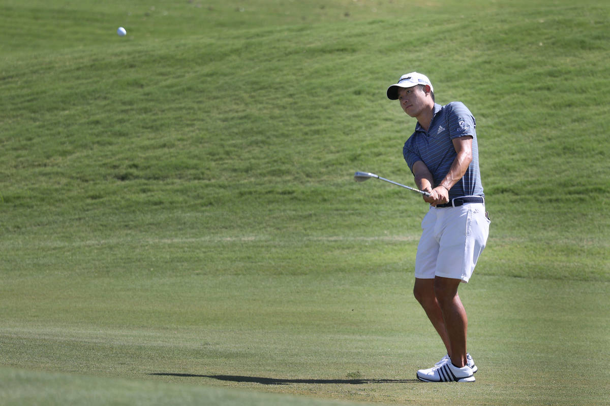 Collin Morikawa hits a chip shot during the 2020 Shriners Hospitals for Children Open practice ...