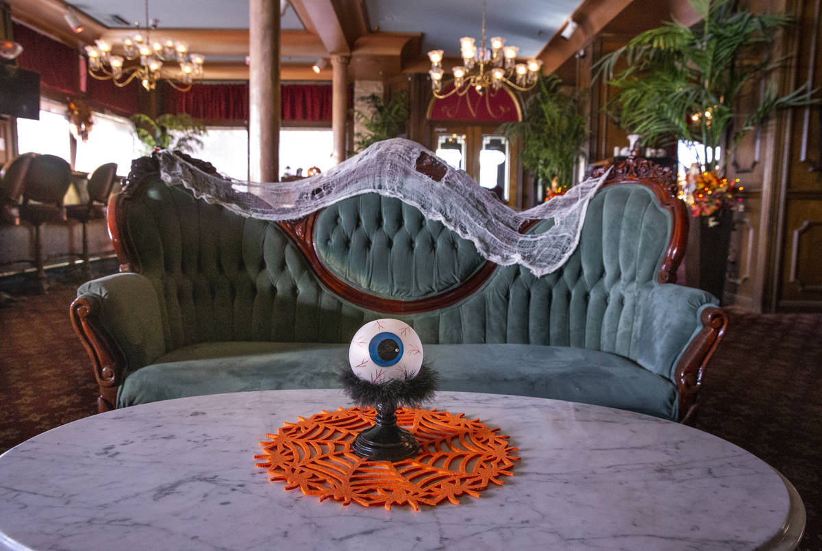 A large eyeball and Halloween decorations about the sitting room at the Mizpah Hotel in Tonopah ...
