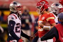 New England Patriots cornerback Stephon Gilmore, left, talks with Kansas City Chiefs quarterbac ...