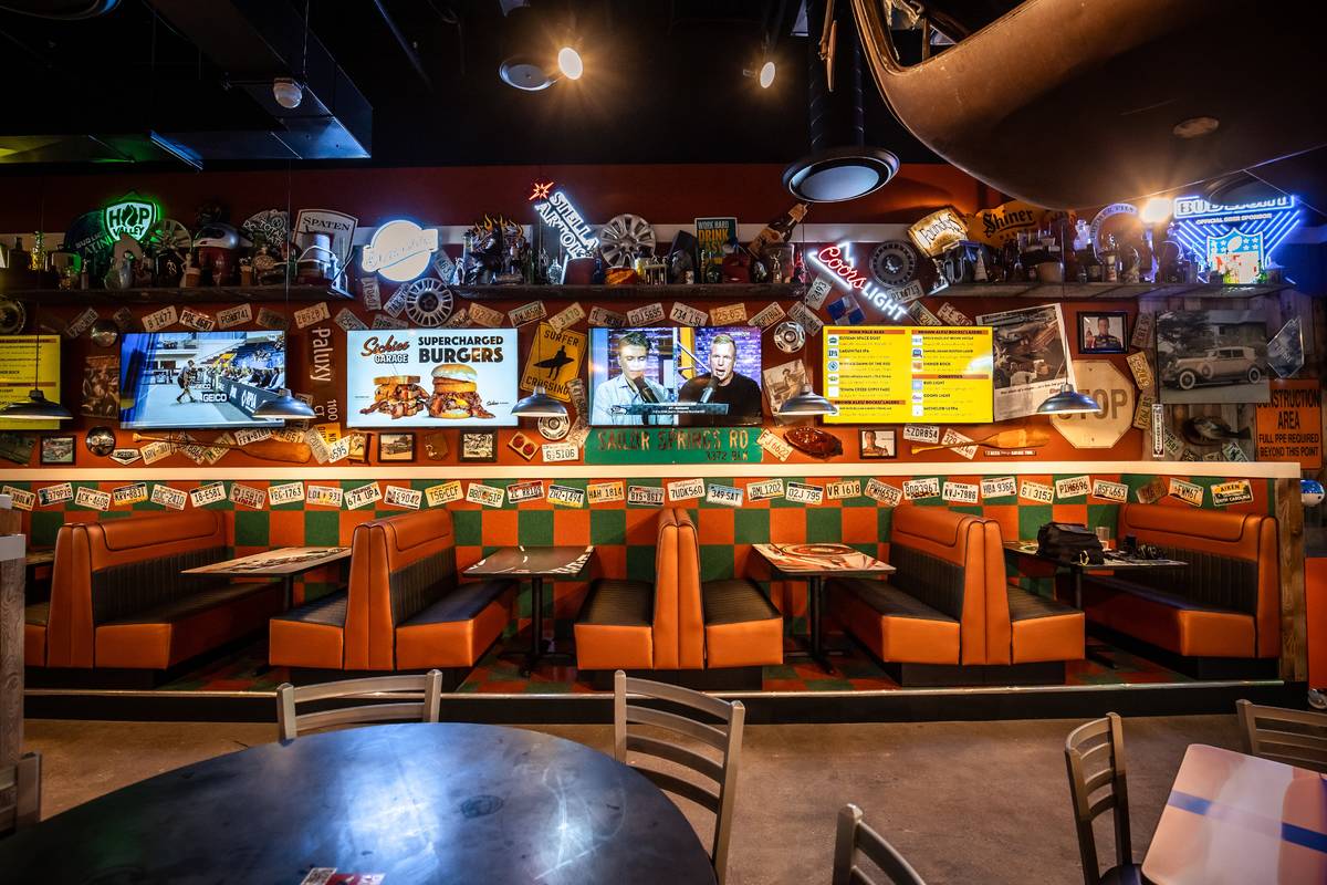 TVs line the wall at Sickie's Garage Burgers & Brew (Sickies Garage Burgers & Brew)
