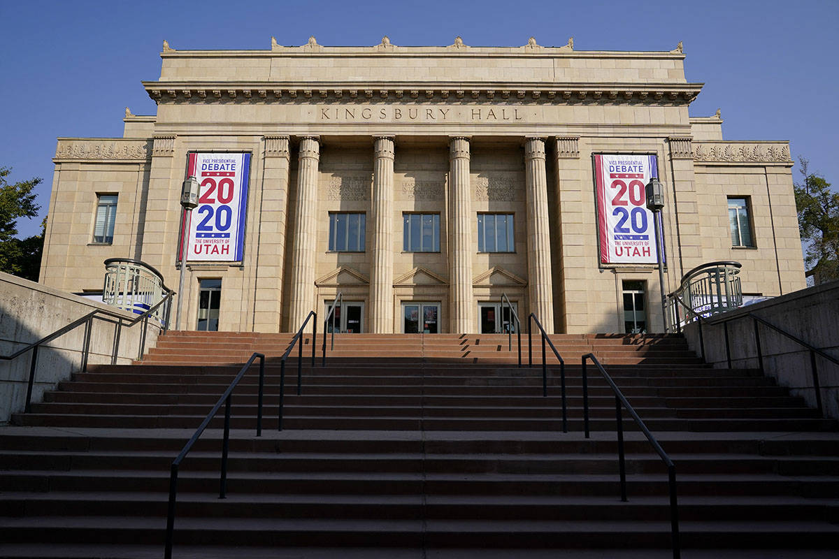 Banners hang from Kingsbury Hall at the University of Utah as preparations take place for the v ...