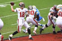 Tampa Bay Buccaneers quarterback Tom Brady (12) throws a pass against the Los Angeles Chargers ...