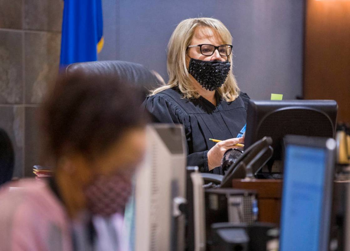 Judge Amy Chelini addresses Sidney Deal during his hearing on child abuse charges in connection ...