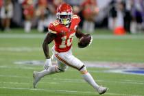 Kansas City Chiefs' Tyreek Hill runs against the San Francisco 49ers during the first half of t ...
