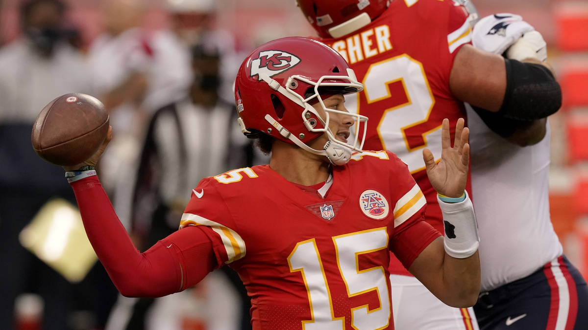 Kansas City Chiefs quarterback Patrick Mahomes (15) throws during the first half of an NFL foot ...