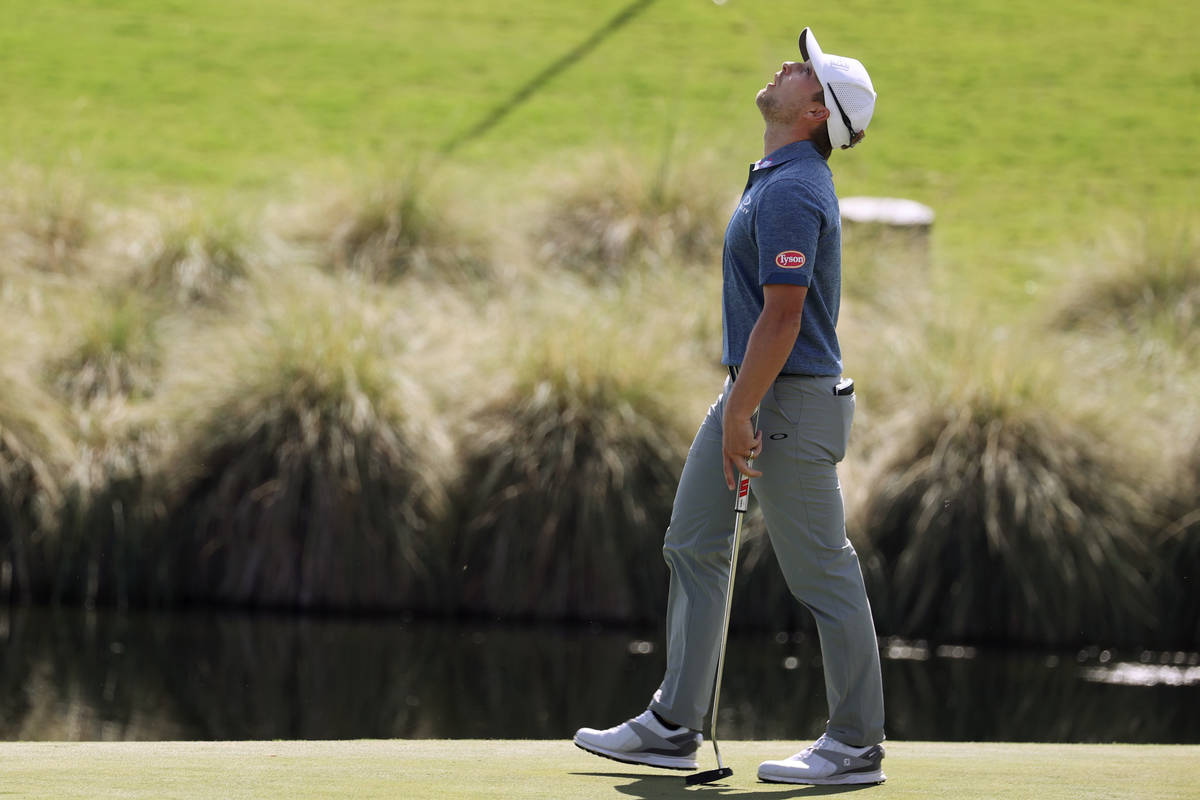 Austin Cook reacts after missing a putt at the 18th hole during round one the 2020 Shriners Hos ...