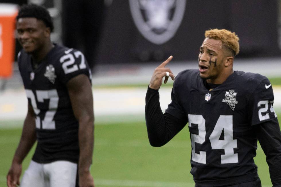 Las Vegas Raiders strong safety Johnathan Abram (24) pumps up the defense during warms up befor ...
