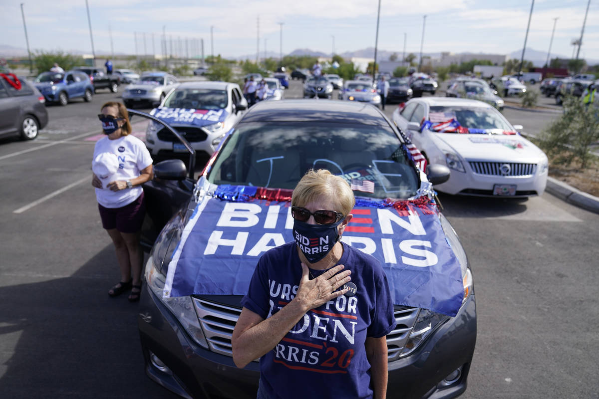 The crowd listens to the National Anthem before Democratic presidential candidate former Vice P ...