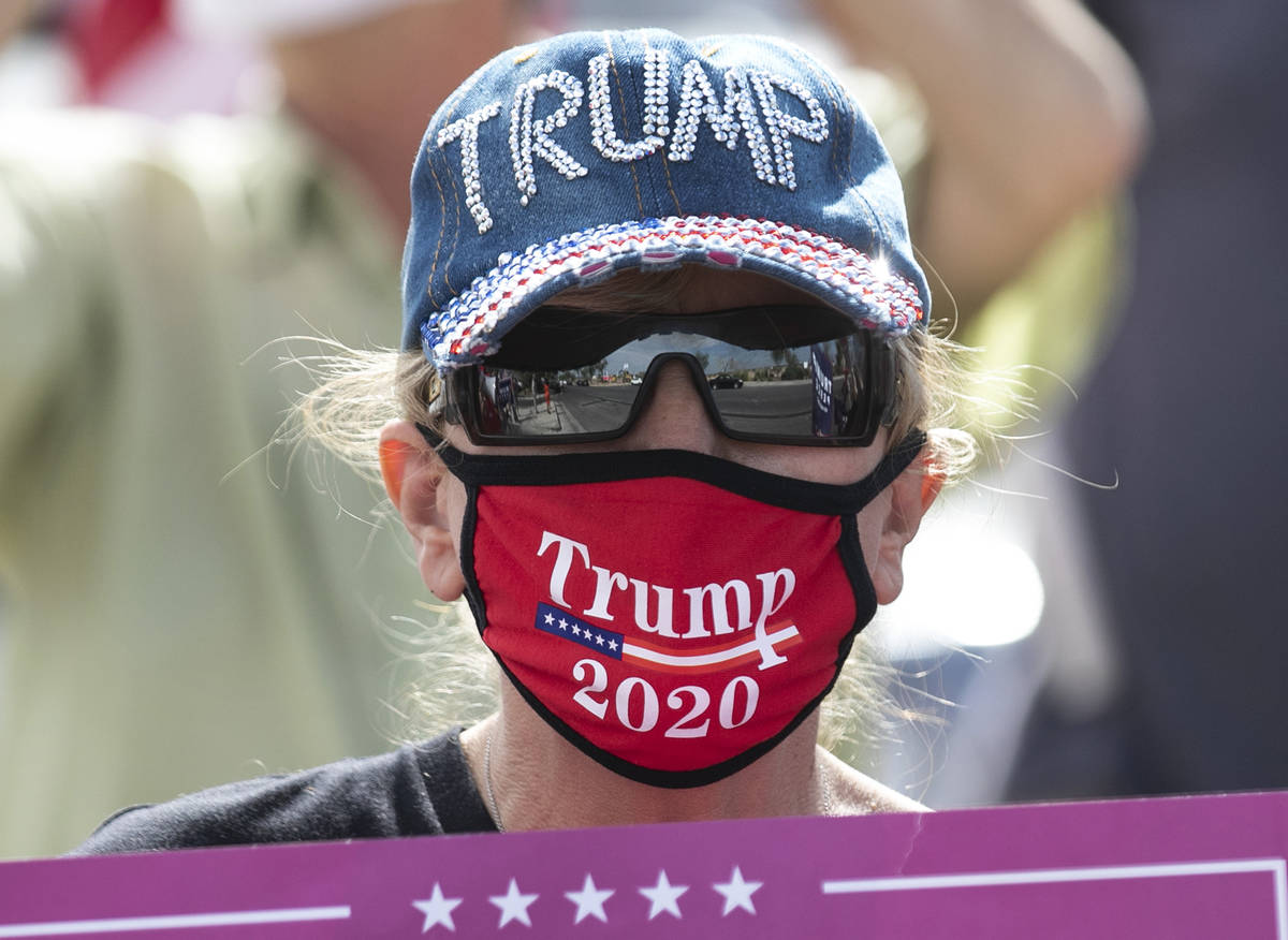 President TrumpÕs supporter Linda Pocaroba protests outside of Southeast Career Technical ...