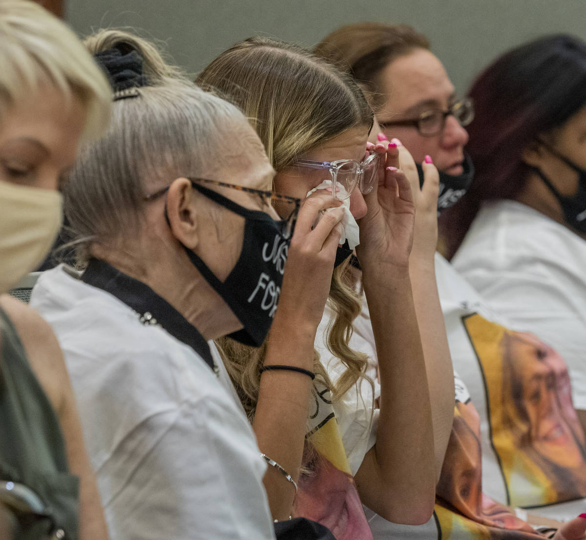 Victim Jennifer Ratay's mother, Mary Ann Ratay, left, daughter Kelsi Jackson, 16, center, and f ...