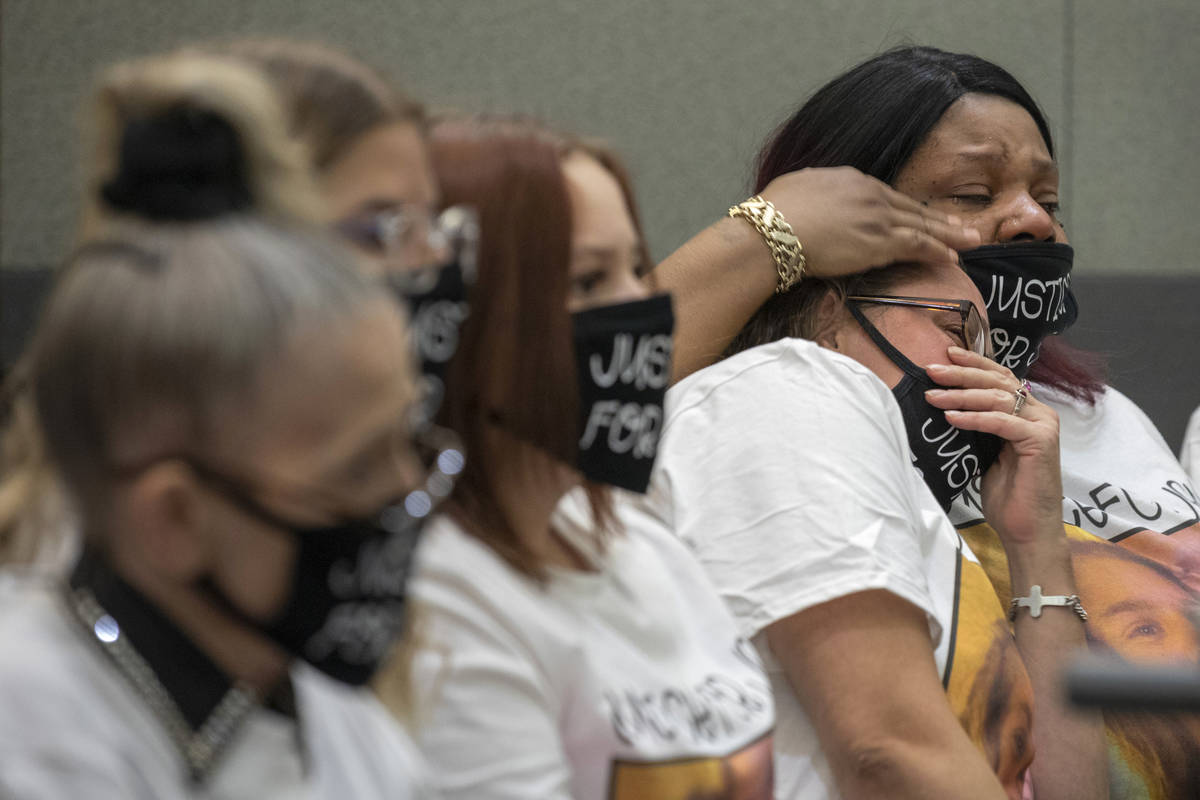 Victim Jennifer Ratay's friends Wendy Wilder, left, and Sharold McNeel, far left, listen as Chu ...