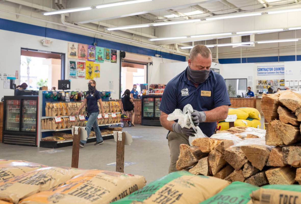General manager Marco Marrocco unwraps firewood at Star Nursery on W Tropicana Ave.,Thursday, O ...