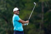 Brooks Koepka watches his tee shot on the 16th hole during the second round of the Wyndham Cham ...
