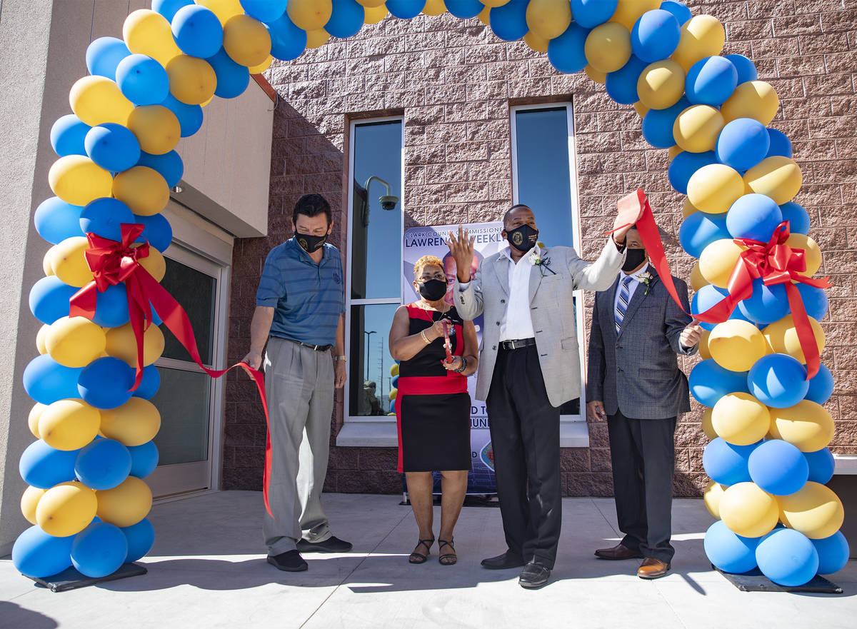 From left, Daniel Hernandez, Director of Clark County, senior Ms. Sarah Cole, Clark County Comm ...