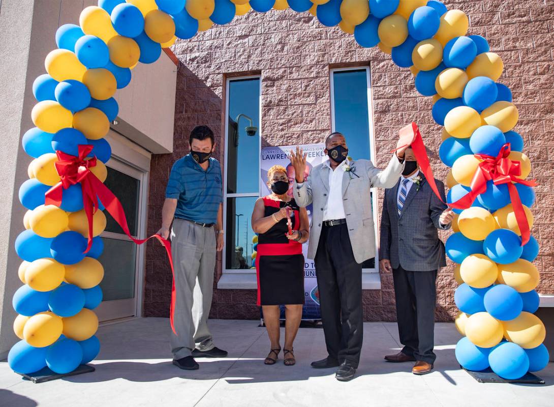 From left, Daniel Hernandez, Director of Clark County, senior Ms. Sarah Cole, Clark County Comm ...