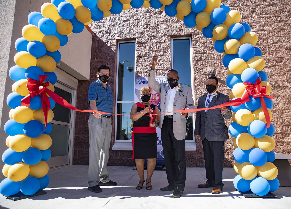 From left, Daniel Hernandez, Director of Clark County, senior Ms. Sarah Cole, Clark County Comm ...