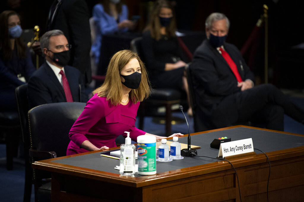 Supreme Court nominee Amy Coney Barrett arrives for her Senate Judiciary Committee confirmation ...