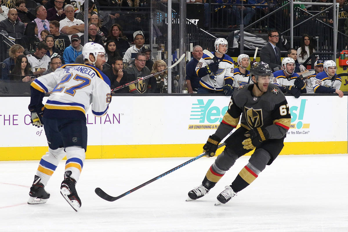 Vegas Golden Knights left wing Max Pacioretty (67) skates past St. Louis Blues defenseman Alex ...
