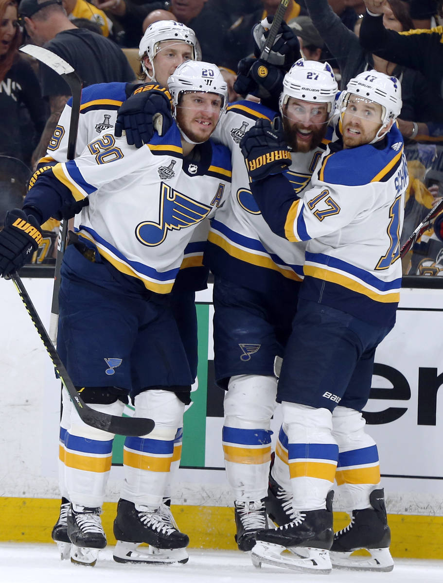 St. Louis Blues' Alex Pietrangelo, second from right, celebrates his goal with teammates Jay Bo ...