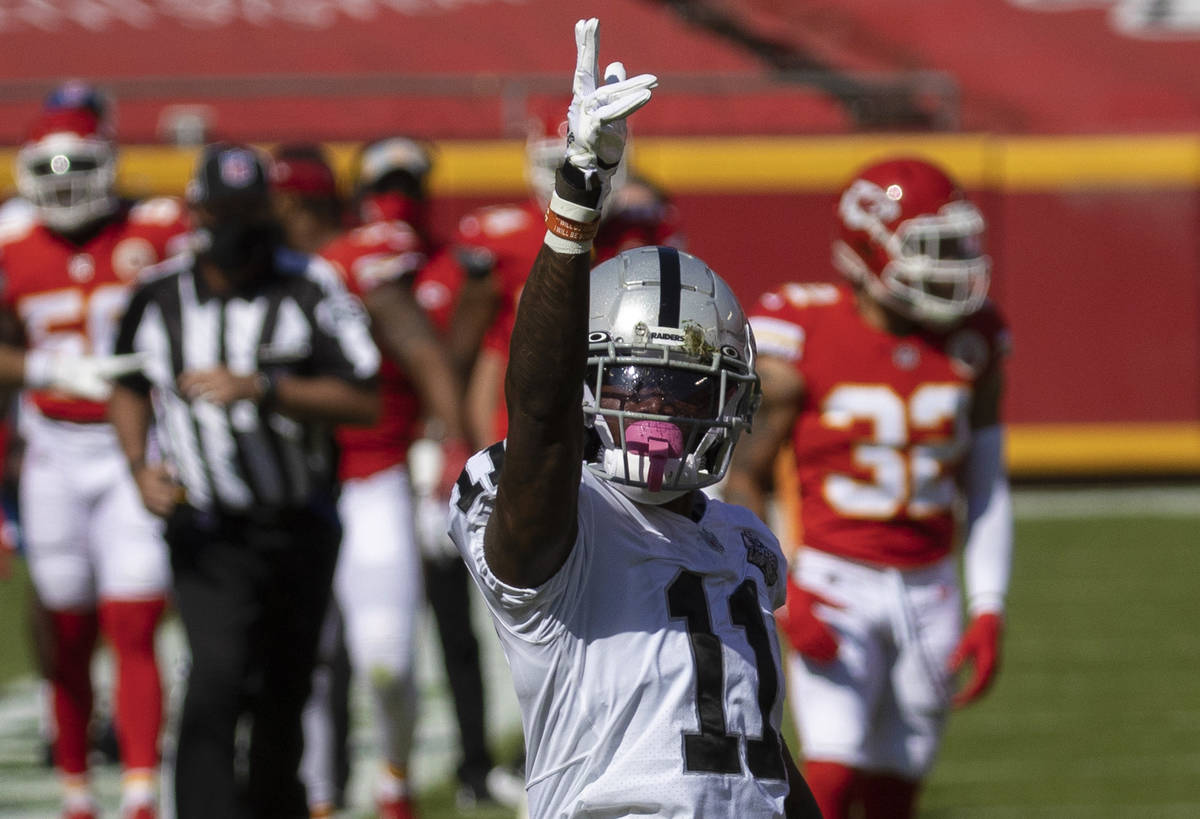 Las Vegas Raiders wide receiver Henry Ruggs III (11) celebrates after making a big catch in the ...