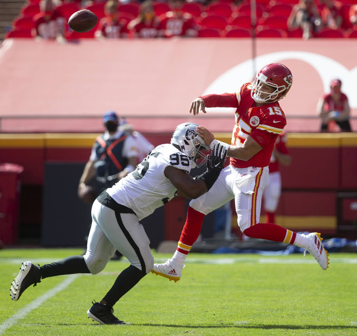 Las Vegas Raiders defensive end Datone Jones (95) pressures Kansas City Chiefs quarterback Patr ...